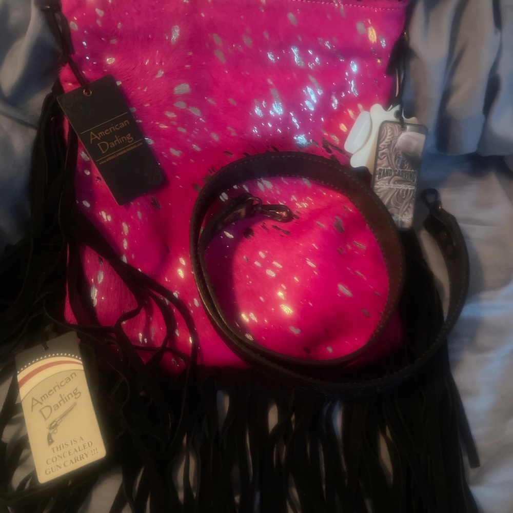 A American Darling shoulder bag. New with tags!! Has pocket for concealed weapon